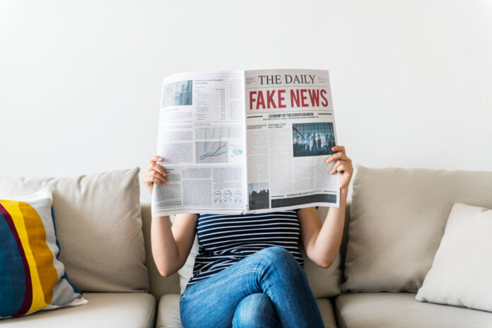 Woman,Reading,Newspaper